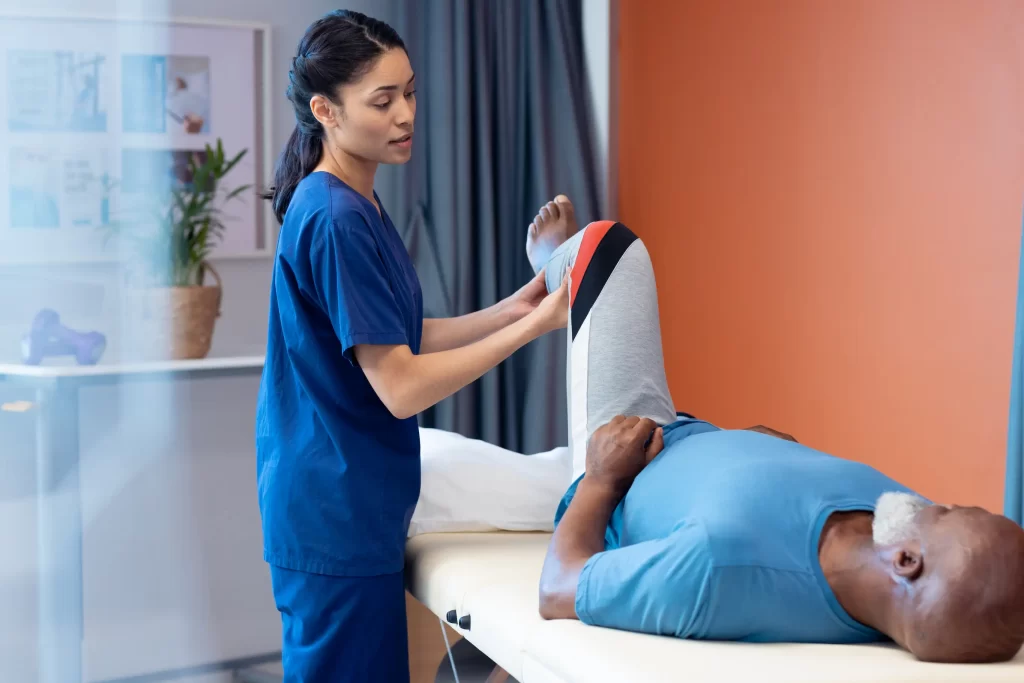 Diverse Female Physiotherapist Treating Leg Of Sen 2025 04 03 12 53 50 Utc - AD3 Contabilidade