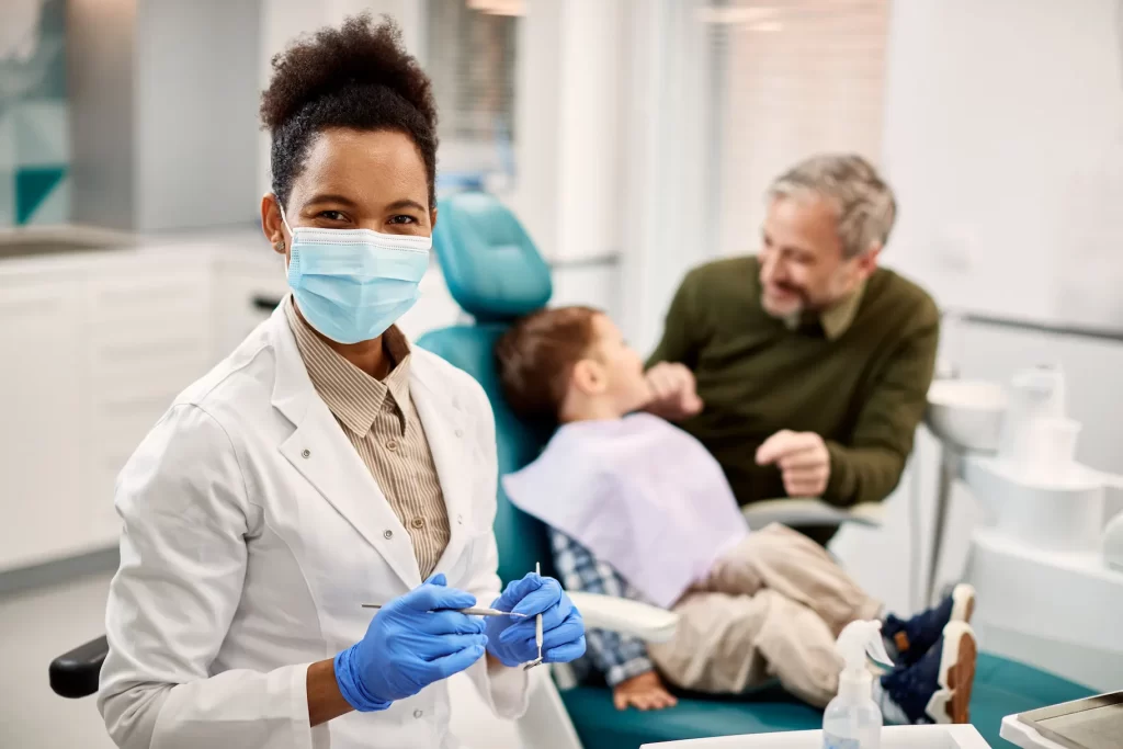 Happy Black Pediatric Dentist At Work Looking At C 2024 12 13 21 08 39 Utc - AD3 Contabilidade